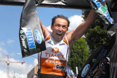 
Winner Viktor Zyemtsev celebrates at the finish line of the 2007 Ford Ironman Coeur d'Alene Sunday. 
 (Jesse Tinsley / The Spokesman-Review)