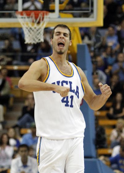 UCLA’s Nikola Dragovic takes on the Cougars and Nikola Koprivica today at 1 in Westwood. (Associated Press / Associated Press)