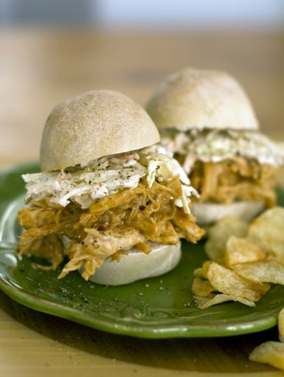 Mango-marmalade pulled chicken can be served on slider-size buns. (Associated Press)