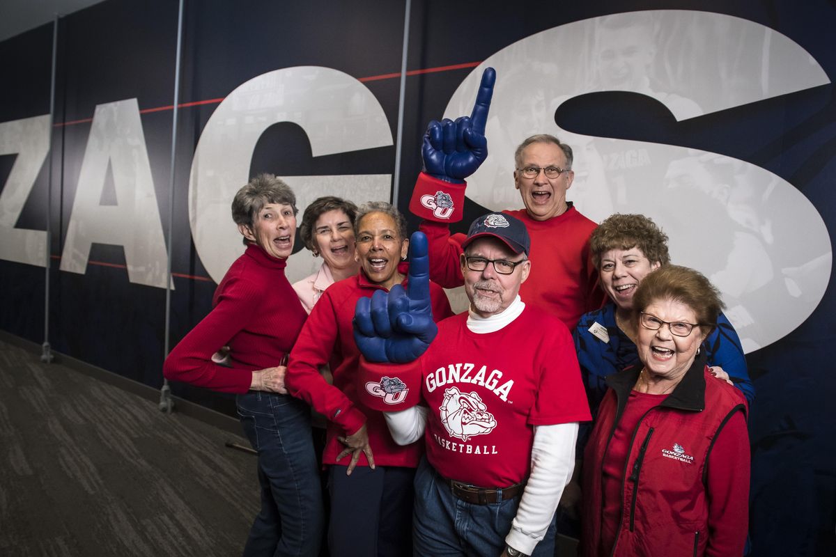 Rockwood Retirement South Hill residents take a break at halftime from the women’s game with San Diego to have a Zags fan photo taken in the McCarthey Athletic Center, Thurs., Feb 22, 2018. From the left: Margaret Patterson, Marilyn Carpenter, Tonya Rice, Mike Rice, Warren Carpenter, Debbie Long and Carole Swensen. (Colin Mulvany / The Spokesman-Review)