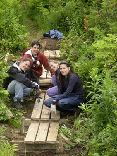 
This undated photo released by Westcoast Connection Teen Travel Experiences shows a group of teens building a boardwalk trail in Peterson Bay, Alaska, with the Center for Alaska Coastal Studies. Associated Press photos
 (Associated Press photos / The Spokesman-Review)