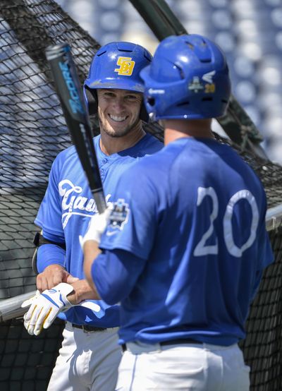 Andrew Calica, left, Dempsey Grover and the UC Santa Barbara Gauchos are one of two teams from the West left in the College World Series. (Mike Theiler / Associated Press)