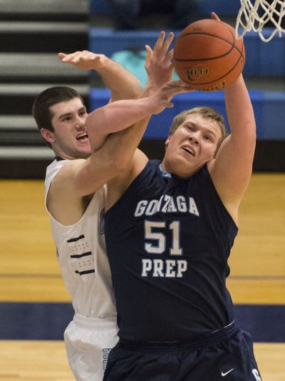 Central Valley’s Beau Byus, left and Gonzaga Prep’s Jack Hunter compete for a rebound Tuesday. (Colin Mulvany)