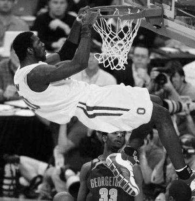 
Ohio State freshman Greg Oden rose to the challenge Saturday against Georgetown and Patrick Ewing Jr. 
 (Associated Press / The Spokesman-Review)