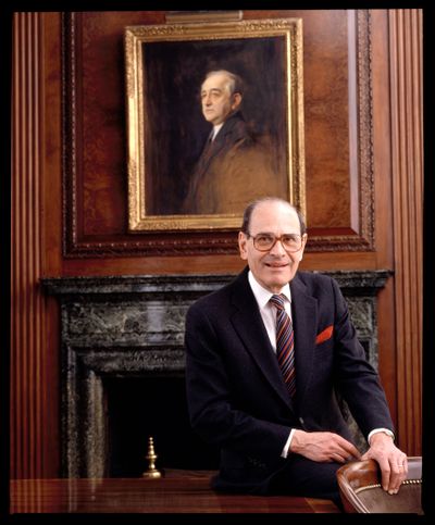In this 1992 photo, Arthur Ochs Sulzberger poses for a photo in the New York Times boardroom beneath a picture of Arthur Ochs, in New York. In 1896, Ochs acquired control of the New York Times. Former New York Times publisher Sulzberger, who led the newspaper to new levels of influence and profit amid some of the most significant moments in 20th-century journalism, died Saturday, Sept. 29, 2012. He was 86. (Burk Uzzle / The New York Times Archive)