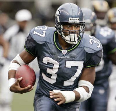 
Coach Mike Holmgren has told Shaun Alexander that he won't play until he can fully practice. Associated Press
 (Associated Press / The Spokesman-Review)