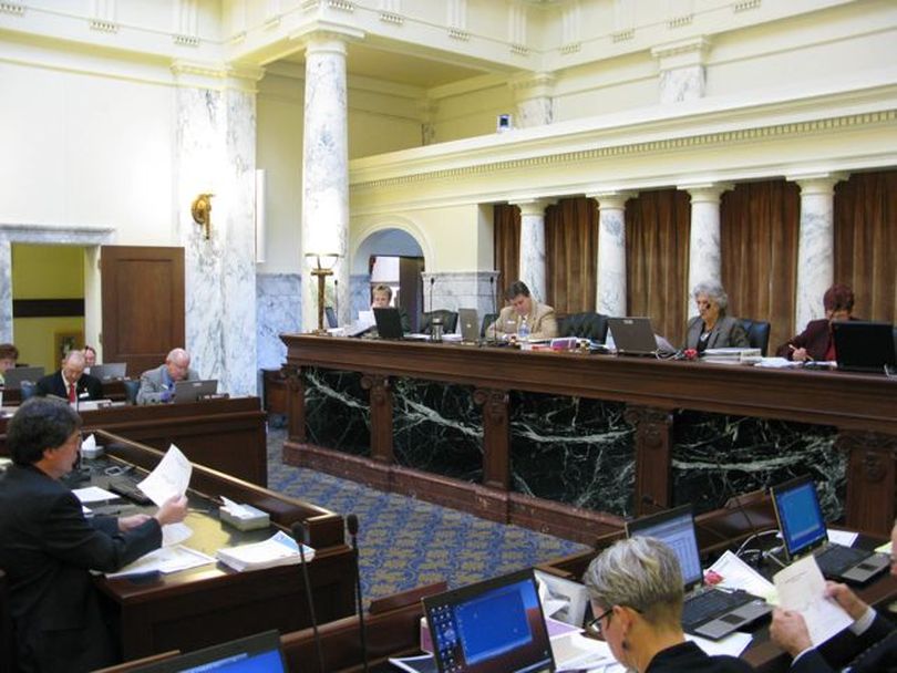 The Joint Finance-Appropriations Committee debates revenue figures on which to base the state budget, both for this year and next year. The panel, along party lines, chose a figure far below the numbers Gov. Butch Otter used to set the budget he earlier submitted to lawmakers, which will mean further cuts. (Betsy Russell)