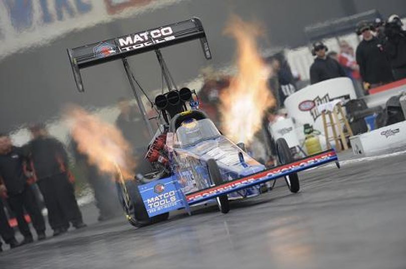 Antron Brown's Matco Tools NHRA Full Throttle Top Fuel Dragster heads down the track. (Photo courtesy of NHRA) (The Spokesman-Review)