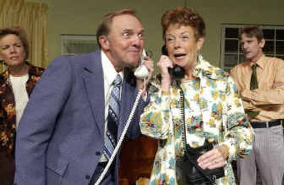 Phelps L'Hommedieu as Frank Foster and Jane Fellows as Teresa Phillips along with background actors Page Byers as Fionna Foster and Patrick Treadway as Bob Phillips, perform a scene in the Actor's Repertory Theatre performance of 