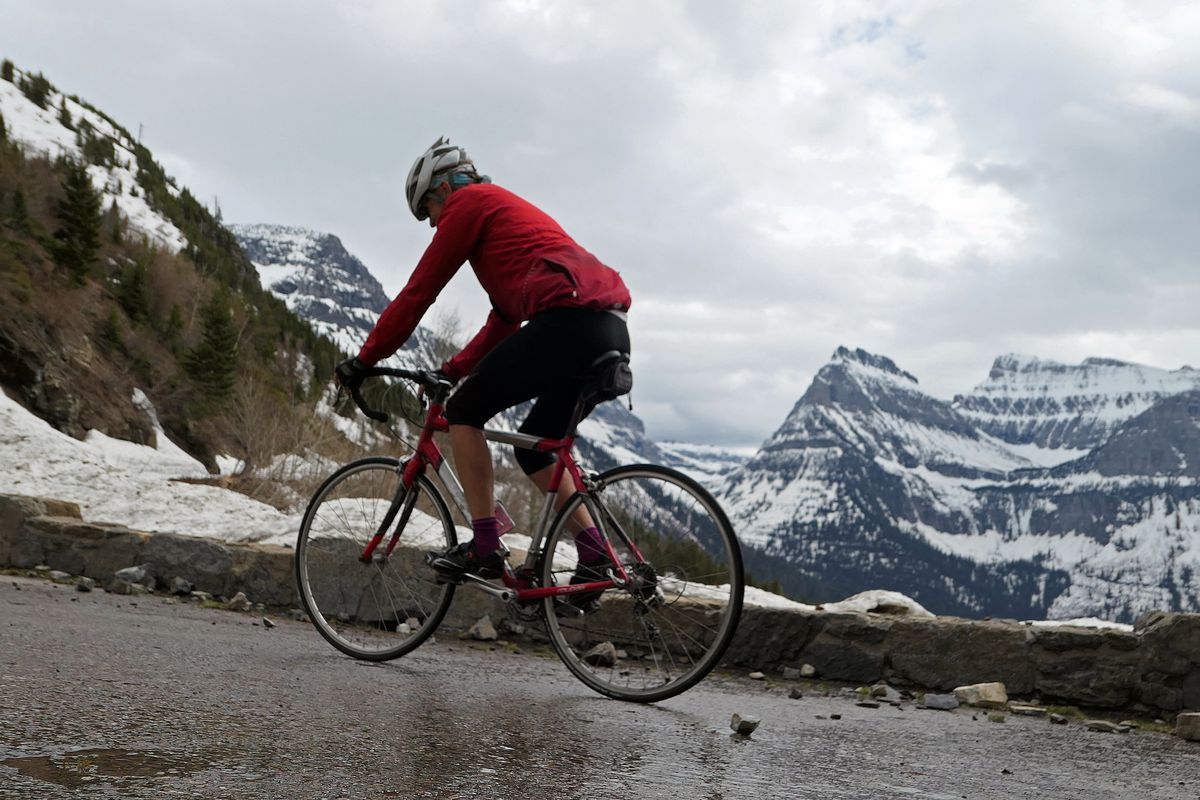 John rides the Going to the Sun Road before it opens to vehicles last spring in Glacier National Park. (John Nelson)