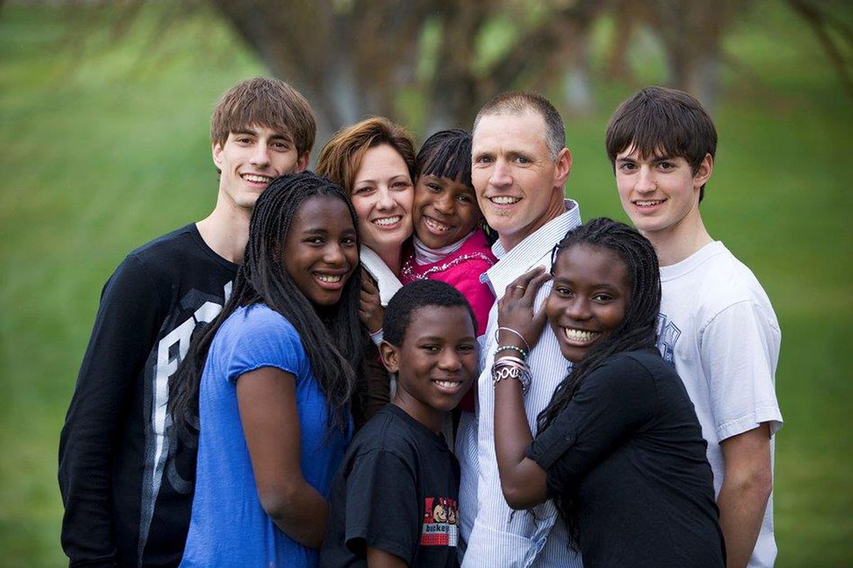 The Bakers pose with their six children in Colville in April 2010: (clockwise from top left) Cody, Kris, Lili, Nat, Kyle, Thamar, Davidson and Kimberly.