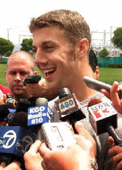 
Alex Smith talks to reporters following the morning workout during a minicamp.
 (Associated Press / The Spokesman-Review)