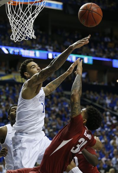 Kentucky forward Willie Cauley-Stein, left, and the Wildcats will try to finish the year with a championship and 40-0 record. (Associated Press)