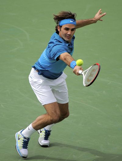 Switzerland’s Roger Federer earned his record fourth title at the BNP Paribas Open tournament in Indian Wells, Calif. (Associated Press)