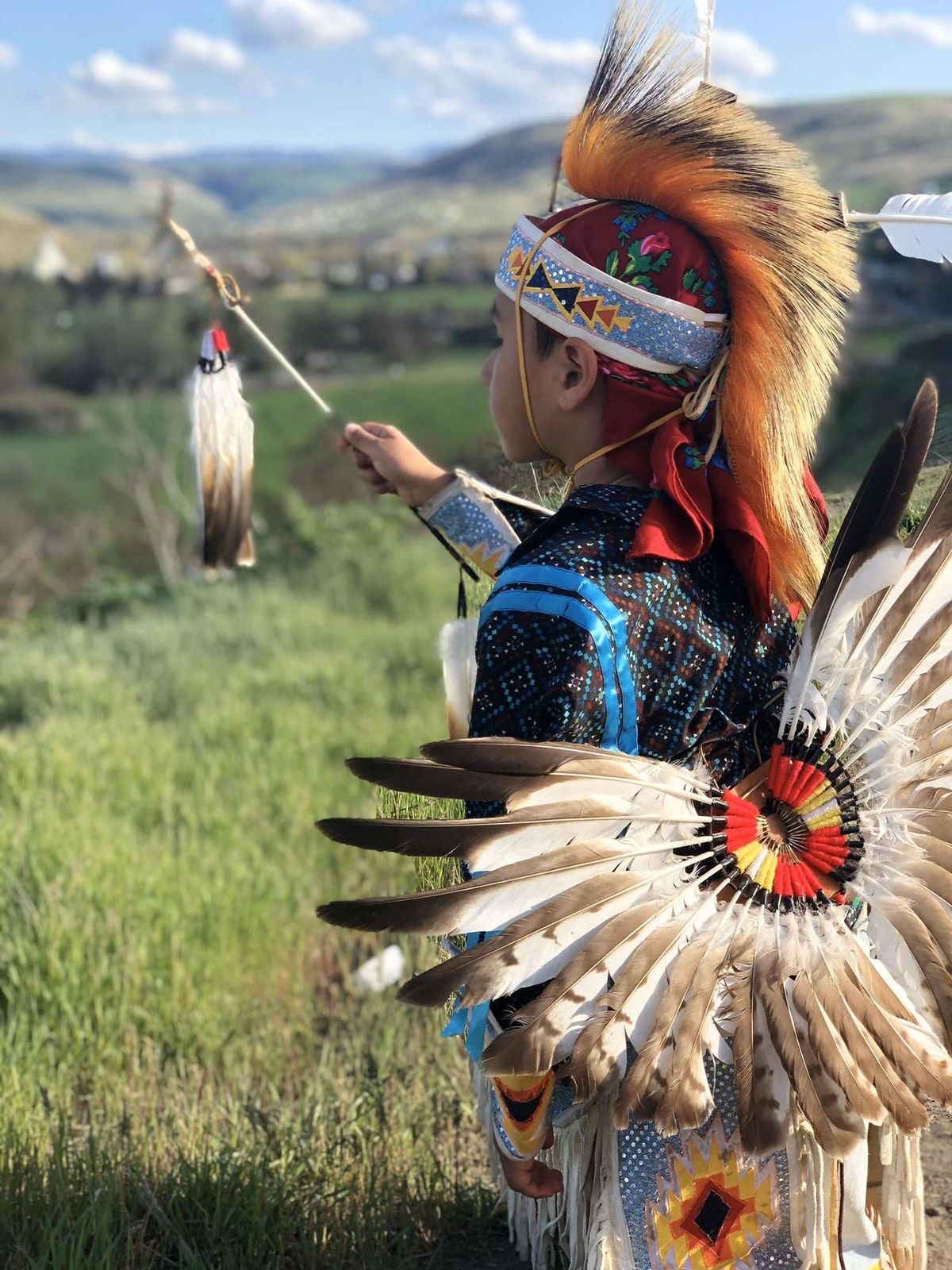 Hashkai Robert Bird’s Prairie Chicken regalia was handmade by his mother. At age four he wanted to dance in multiple categories, but making regalia takes time and money, his mother Shibabe Abrahamson said. He’s now committed to the Prairie Chicken Dance. (Eric Bird / Eric Bird)