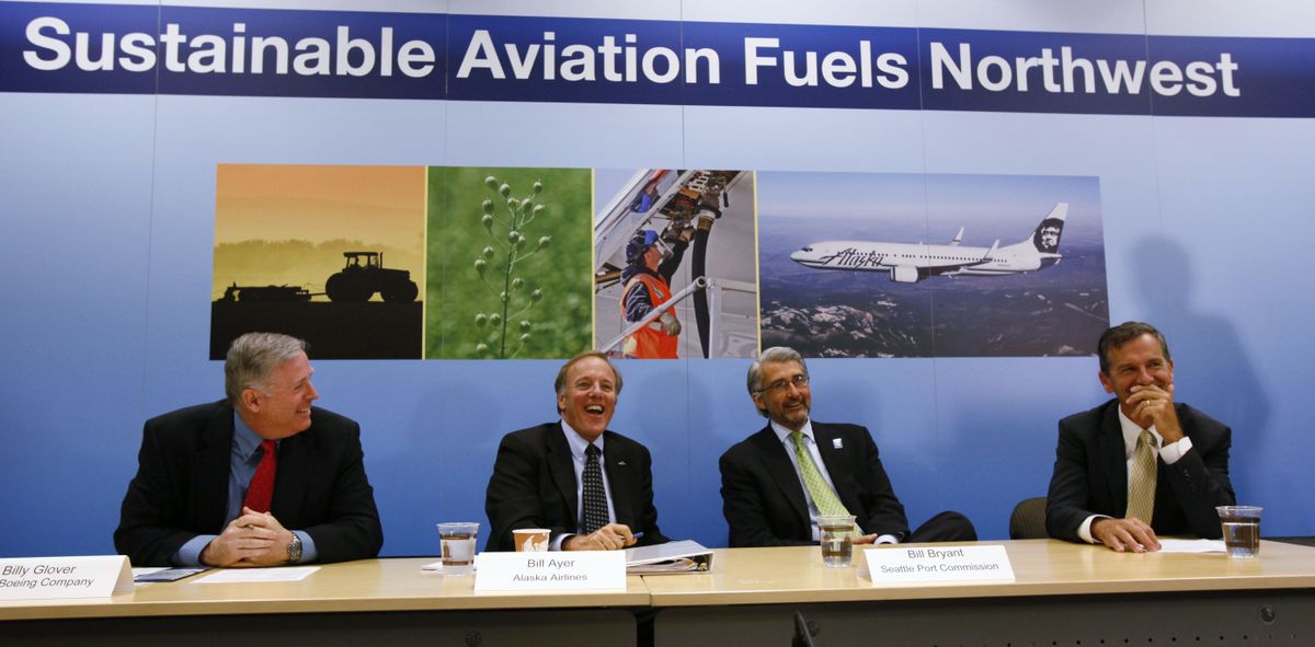From left, Billy Glover, a Boeing vice president, Bill Ayer, Alaska Airlines CEO, Bill Bryant, Port of Seattle Commission president, and John Gardner, a WSU vice president, begin a news conference Wednesday at Sea-Tac to call attention to a biofuels feasibility study. (Associated Press)