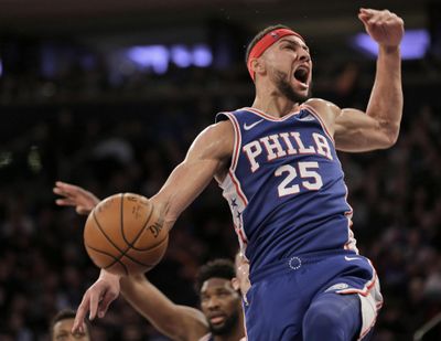 In this Jan. 13, 2019 photo, Philadelphia 76ers' Ben Simmons reacts after dunking during the first half of an NBA basketball game against the New York Knicks in New York. A person familiar with the situation says the Philadelphia 76ers and star guard Ben Simmons have agreed to a $170 million, five-year contract extension. The max deal is the latest big commitment by the team. (Seth Wenig / Associated Press)