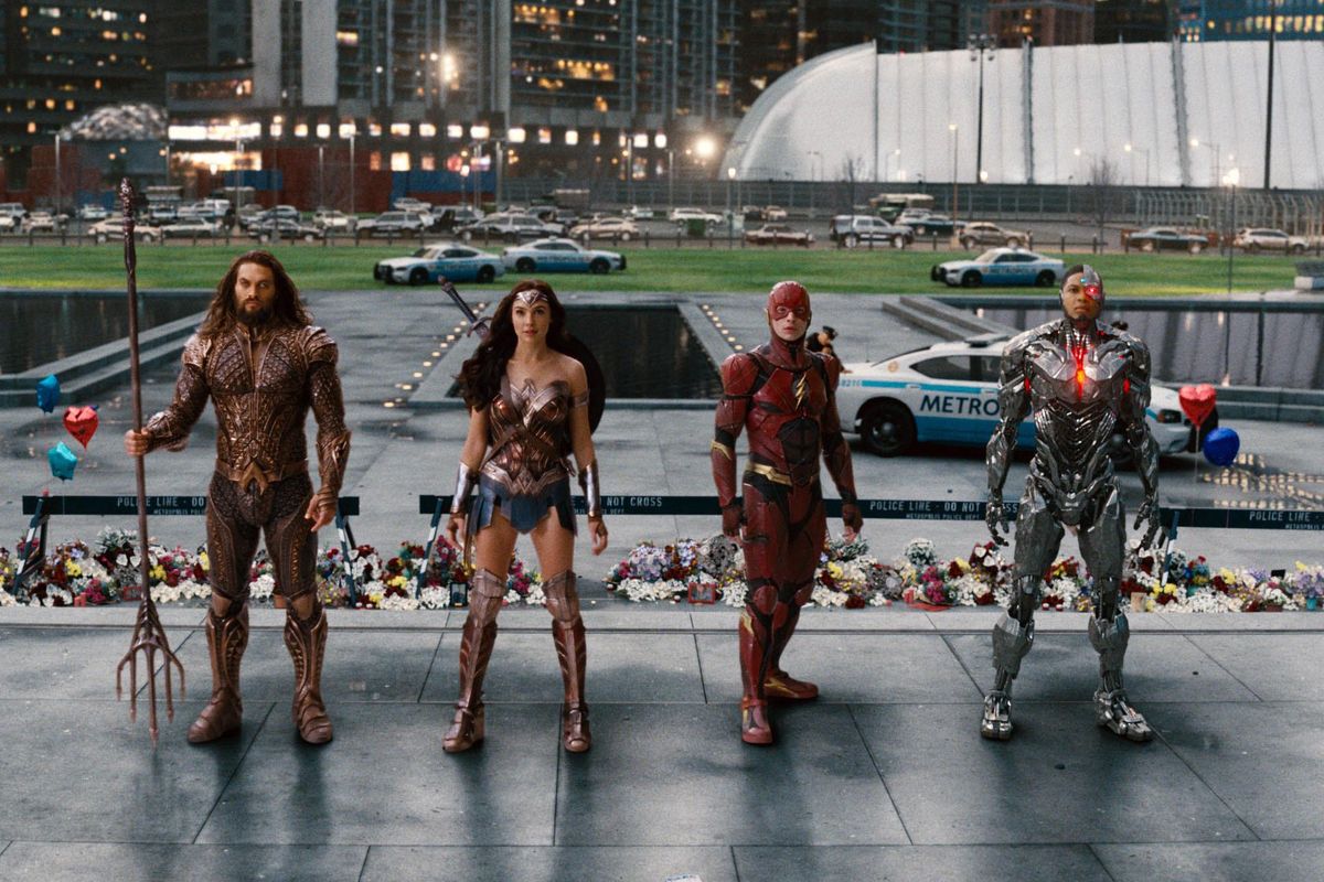Jason Momoa, from left, Gal Gadot, Ezra Miller and Ray Fisher in a scene from "Justice League." (Warner Bros.)