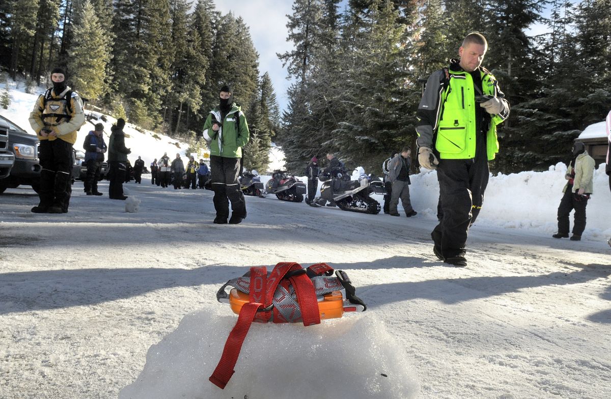 Participants in an Avalanche Awareness class learn to use avalanche beacons during a demonstration at the Fourth of July Pass snowmobile area Saturday.  (Photos by Christopher Anderson / The Spokesman-Review)