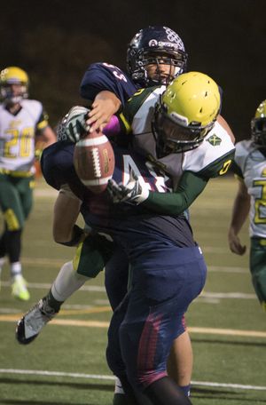 After a Highlander onside kick, Shadle's Cam Duty (9) almost recovers the ball, but the possession went to the Wildcats in the first half Thusday at Joe Albi Stadium. (Colin Mulvany / The Spokesman-Review)