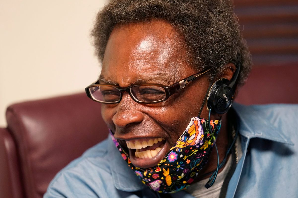 Henry Montgomery laughs inside the Louisiana Parole Project offices in Baton Rouge, La. after being released from the Louisiana State Penitentiary, after serving 57 years in prison, Wednesday, Nov. 17, 2021. Montgomery, central to a Supreme Court case that extended the possibility of freedom to hundreds of people sentenced to life without parole as juveniles has been released from prison after being granted parole. (Gerald Herbert)