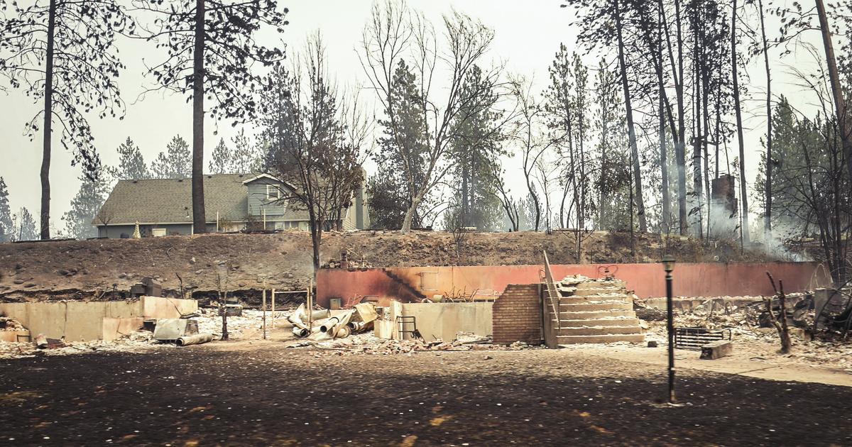 Spokane firefighters battle Old Trails wildfire in residential neighborhood