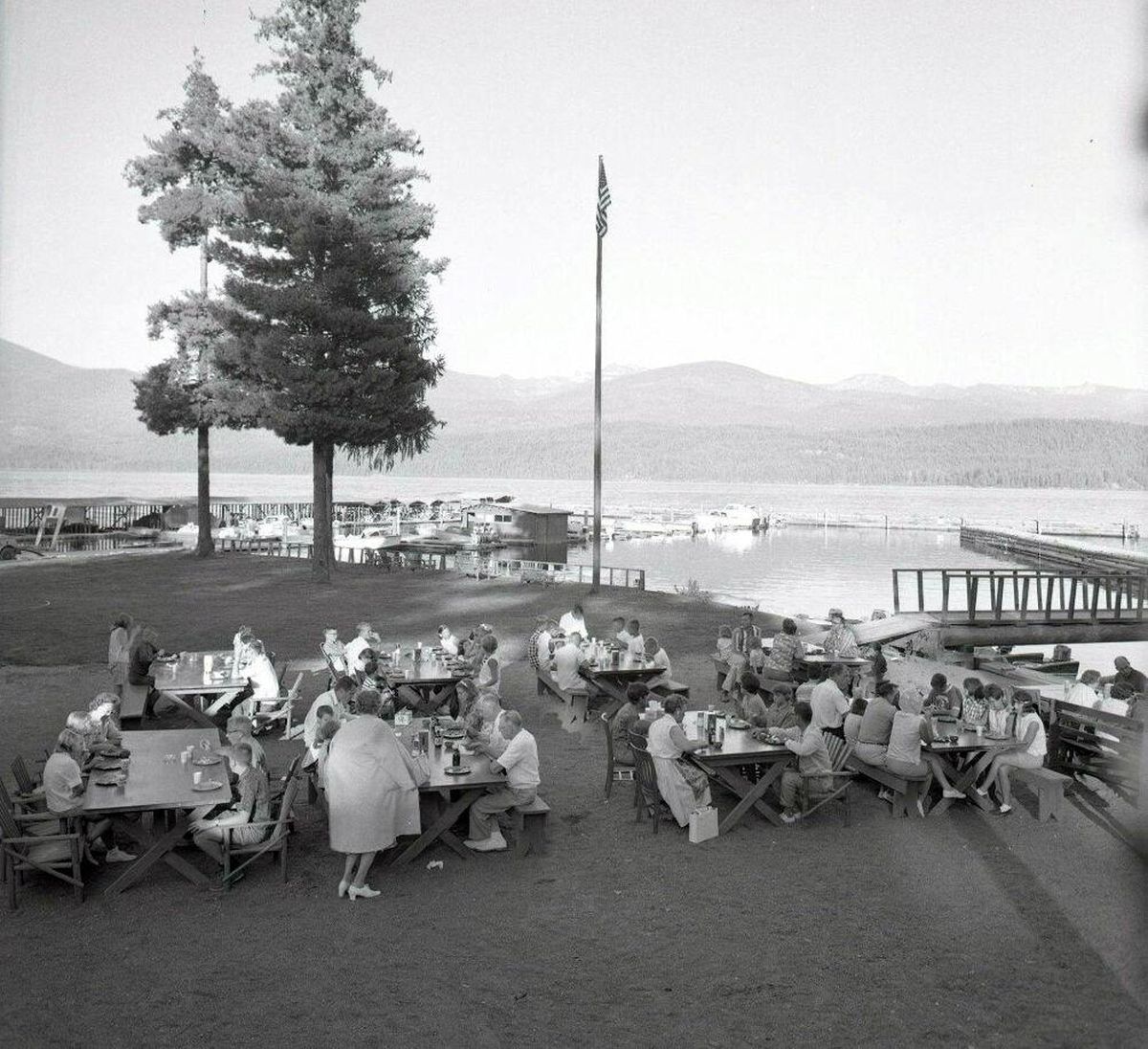 This undated historical image, provided by Elkins Resort current owner Tracie Szybnski, shows visitors dining on the lawn at the resort.  (Photo courtesy of Tracie Szybnsk)
