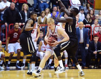 Vandals defenders try to slow down a drive by Eagles’ Bogdan Bliznyuk in a late-January EWU win. (Tyler Tjomsland / The Spokesman-Review)