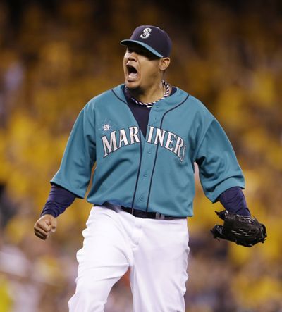 M’s Felix Hernandez was ecstatic over an inning-ending double play in the eighth. (Associated Press)