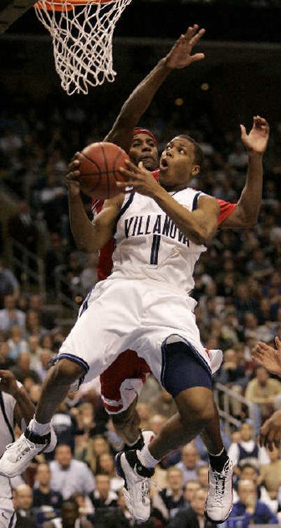
Villanova's Kyle Lowry goes up for two against Arizona. 
 (Associated Press / The Spokesman-Review)
