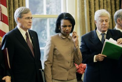 National Security Adviser Stephen Hadley and Secretary of State Condoleezza Rice meet with President Bush and others in the White House in this 2006 photo. Hadley led a review of U.S. policy in Iraq during the fall of 2006.  (Associated Press / The Spokesman-Review)