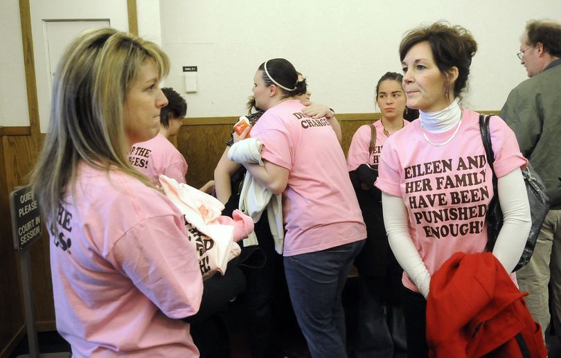 Supporters of Eileen Jensen, including Michelle McLuskie, left, sister Christina Jensen, getting a hug, and Carla Schauer, right, gather at the Spokane County Courthouse on Feb. 18, 2009, after Eileen Jensen was arraigned on a charge of vehicular homicide for the death of her infant daughter. Jensen pleaded not guilty.  (Dan Pelle / The Spokesman-Review)