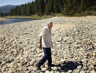 
Harold Honeycutt of Orient walks along his property where an old law states he may have water rights to the Kettle River. 
 (Brian Plonka / The Spokesman-Review)