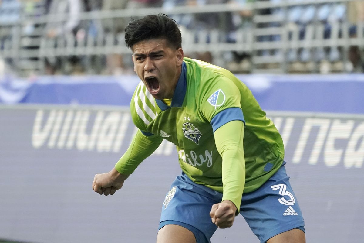 Seattle Sounders defender Xavier Arreaga celebrates after scoring a goal against Los Angeles FC during the second half of an MLS soccer match, Sunday, May 16, 2021, in Seattle. The goal was Arreaga