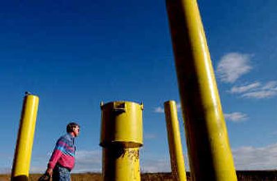 
U.S. Geological Survey technician Keith Hein tests a well in Post Falls on Monday as part of a study of the Spokane Valley-Rathdrum Prairie Aquifer. 
 (Kathy Plonka / The Spokesman-Review)