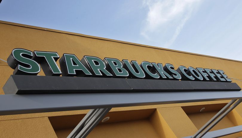 A Starbucks Coffee shop is shown in Mountain View, Calif., on Tuesday. The Seattle-based coffee chain is raising prices by about 1 percent in the Northeast and Sunbelt regions. (Associated Press)