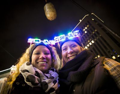 Shelby Besler left, and her mother, Tracey, smile for a photograph on New Year's Eve as revelers ring in 2015 with the Idaho Potato Drop in downtown Boise
. (Darin Oswald / Darin Oswald/
The Idaho Statesman)