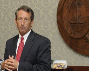 Gov. Mark Sanford announces that he will not resign in Columbia, S.C., on Wednesday.  (Associated Press / The Spokesman-Review)