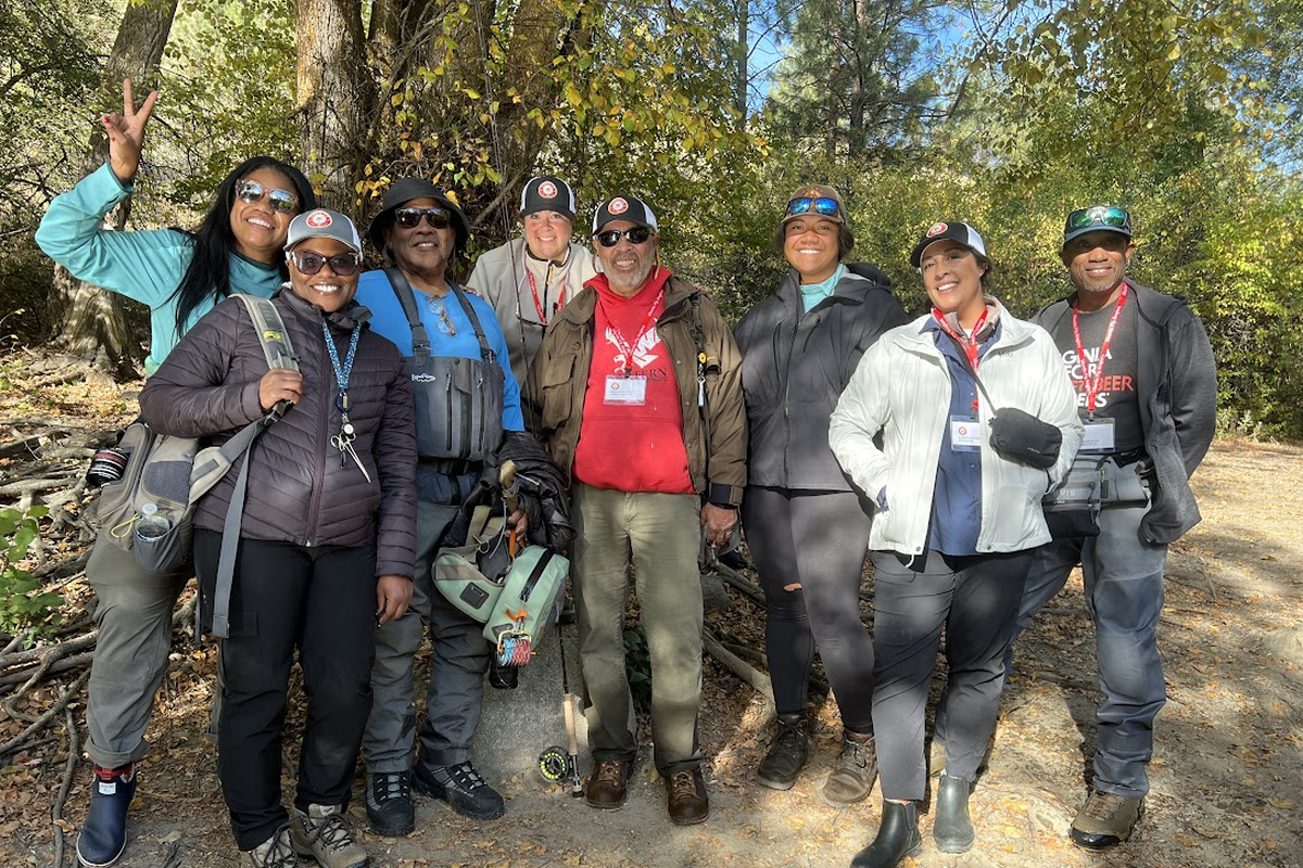 Bob Bartlett, center in red, is surrounded by other Black and Brown anglers.   (Courtesy )