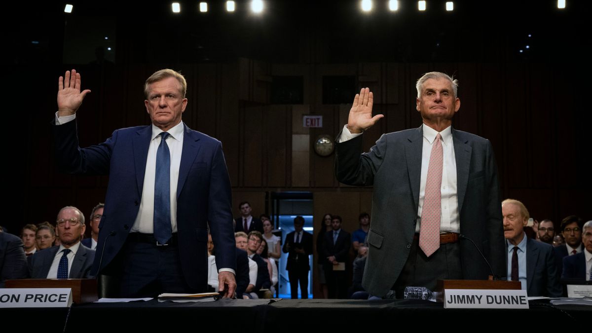 PGA Tour chief operating officer Ron Price, left, and Jimmy Dunne of the tour’s policy board are sworn in Tuesday at a Senate subcommmittee hearing on a proposed alliance in professional golf that would be backed by a Saudi investment fund.  (Bill O