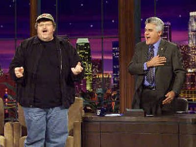 
Michael Moore, left,  and 