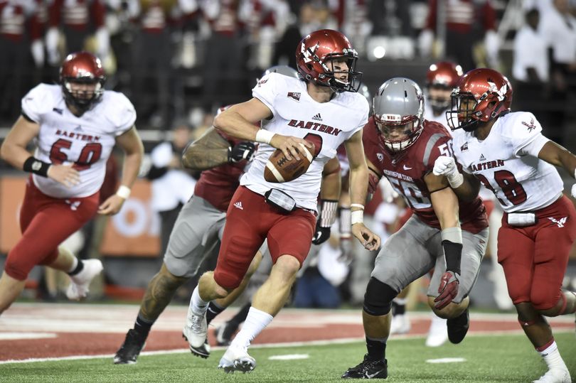 Eastern Washington Eagles quarterback Gage Gubrud (8) runs the ball for a first down during the second half of a college football game on Saturday, Sep 3, 2016, at Martin Stadium in Pullman, Wash. EWU won the game 45-42. (Tyler Tjomsland / The Spokesman-Review)