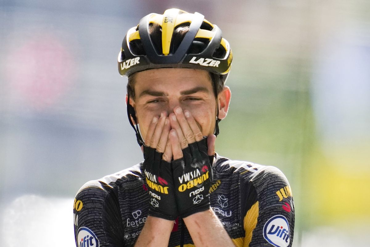 Sepp Kuss of the US celebrates as he crosses the finish line to win the fifteenth stage of the Tour de France cycling race over 191.3 kilometers (118.9 miles) with start in Ceret and finish in Andorra-la-Vella, Andorra, Sunday, July 11, 2021.  (Christophe Ena)