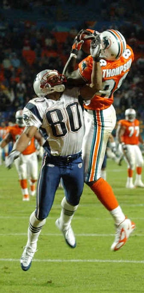 The Miami Dolphins quarterback A.J. Feeley (7) hands off in first quarter  action September 26 2004 against the Pittsburgh Steelers at Pro Player  Stadium in Miami, Fl. The Game was held in