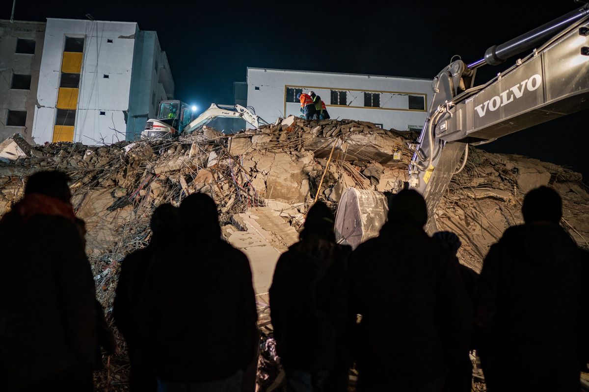 Rescue workers look through the rubble for survivors Thursday in the Turkish town of Nurdagi.  (Salwan Georges/The Washington Post)