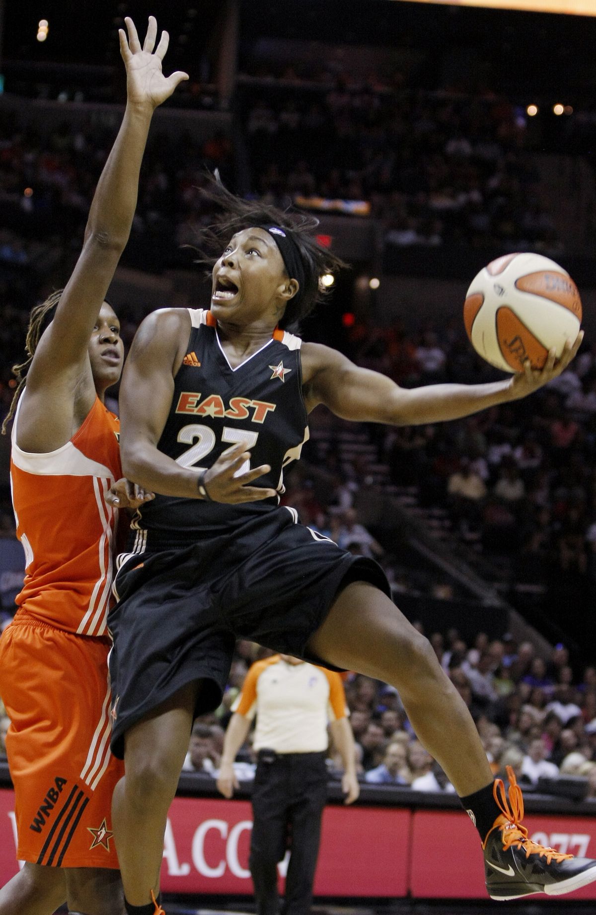 The East’s Cappie Pondexter shoots over Rebekkah Brunson during the first half of the WNBA All-Star game. (Associated Press)