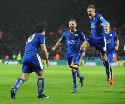 Leicester’s Shinji Okazaki, left, celebrates with teammates Jamie Vardy, right, and Daniel Drinkwater after scoring during the English Premier League soccer match between Leicester City and Newcastle United. (Rui Vieira / Associated Press)