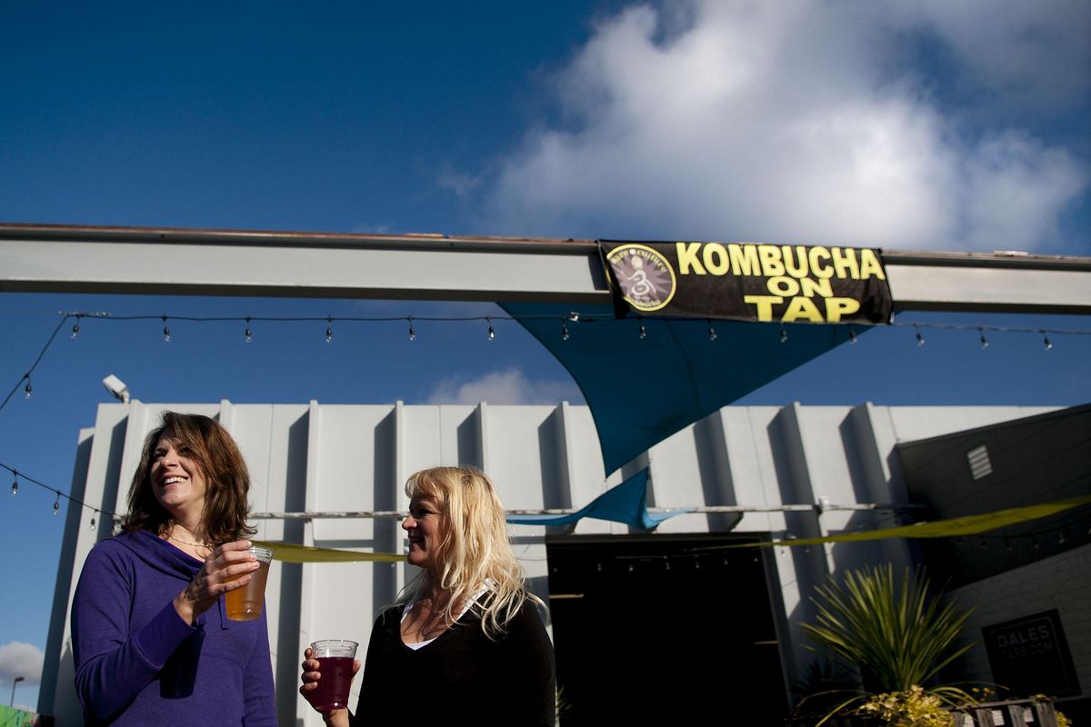 Renetta Seeley, left and Heather Threadgill talked about their new business, Bare Culture Kombucha in Coeur d'Alene on Tuesday, Oct. 20, 2015. Kombucha is produced by fermenting tea using a "symbiotic 'colony' of bacteria and yeast". (Kathy Plonka / The Spokesman-Review)