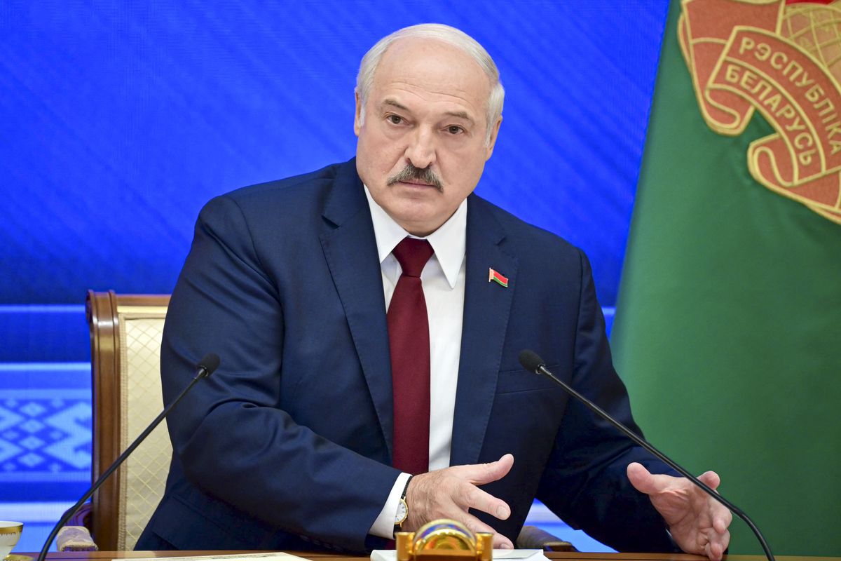 Belarusian President Alexander Lukashenko gestures while speaking during an annual press conference in Minsk, Belarus, Monday, Aug. 9, 2021. Belarus