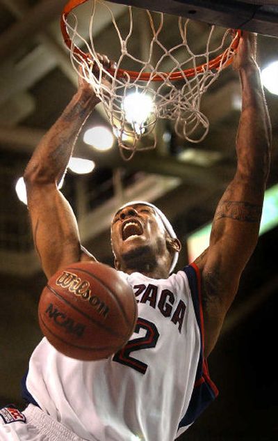 
Erroll Knight's second-half slam Saturday gave the Bulldogs momentum during their win over San Diego. 
 (Brian Plonka / The Spokesman-Review)